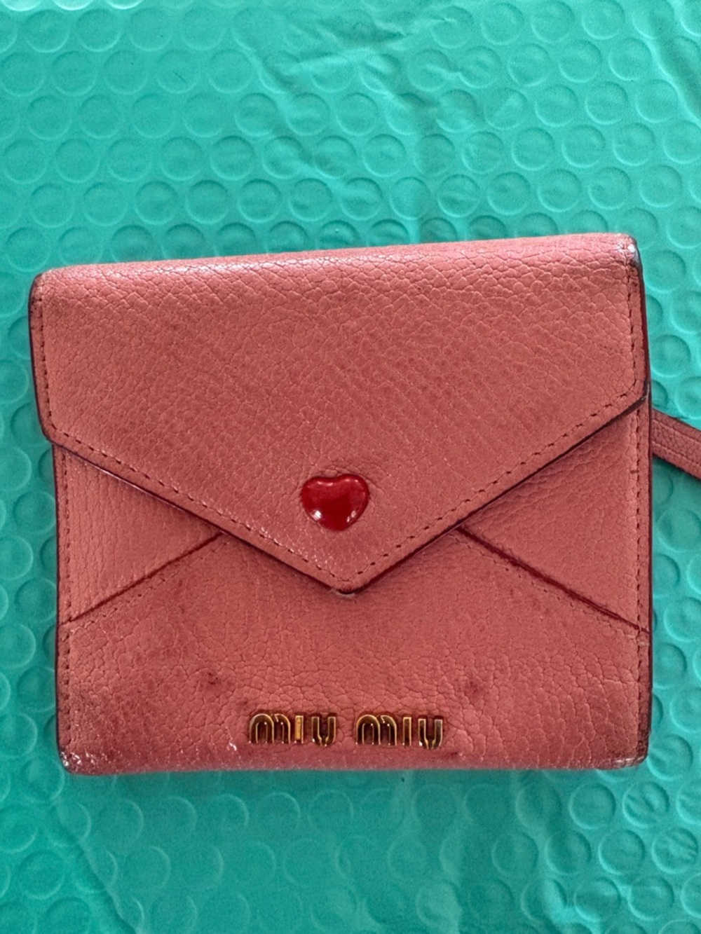 Authentic Mui Mui Compact Wallet in Dark Pink Leather with Red Interior